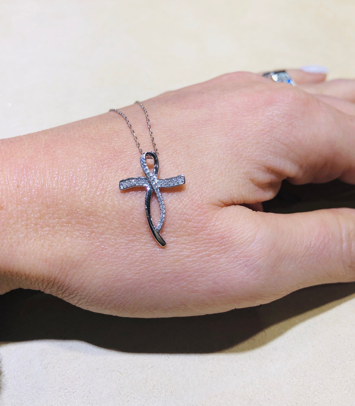 .10 Ctw Diamond and White Gold Cross Pendant