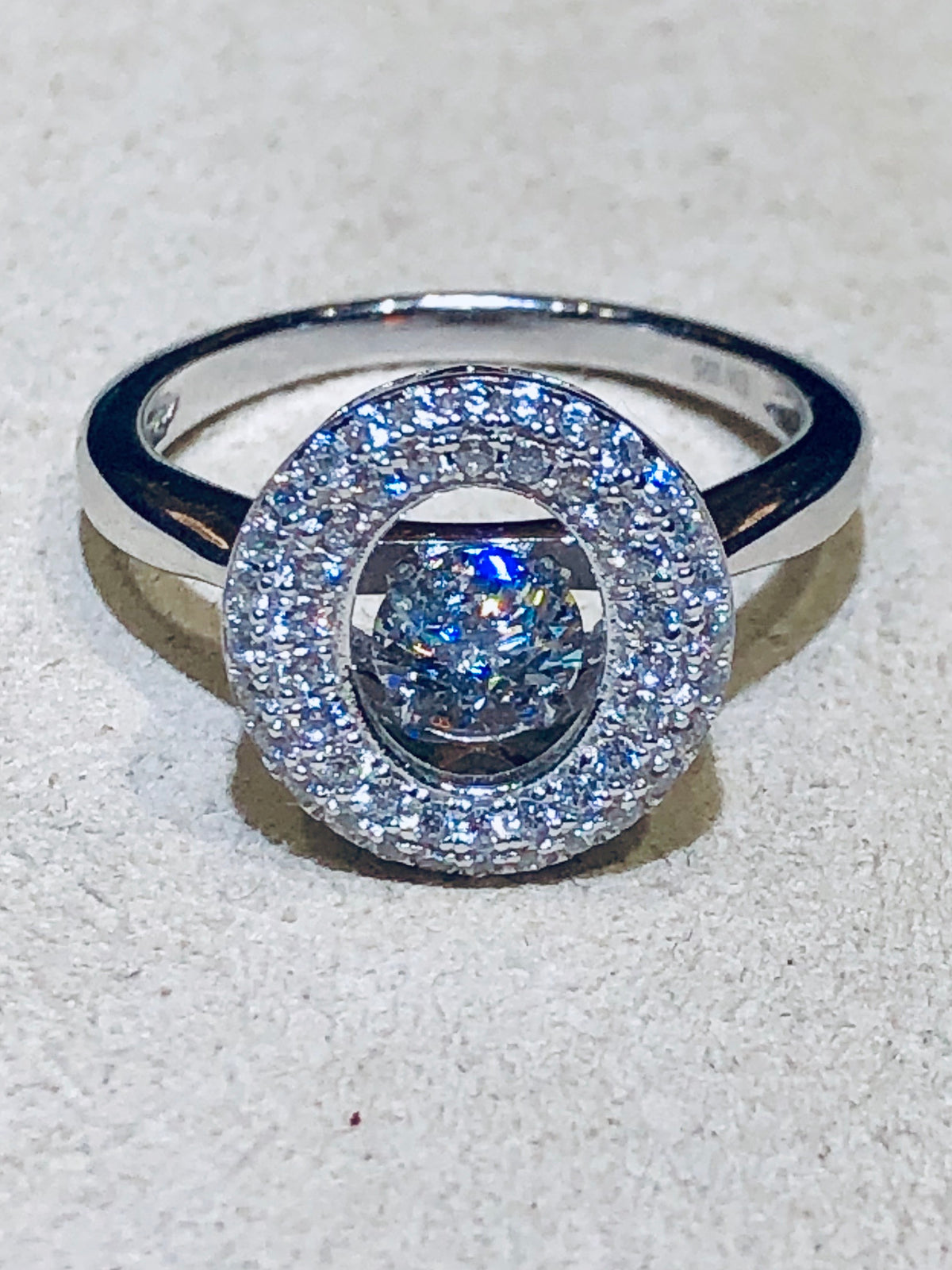 “Dancing Dangling Diamond” Halo Oval Ring
