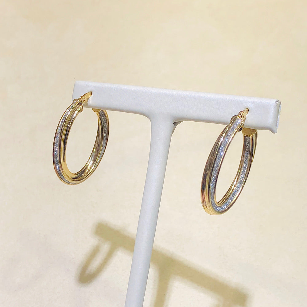 "Diamond Dust" collection 14 Kt Yellow Gold Oval Hoop Earrings