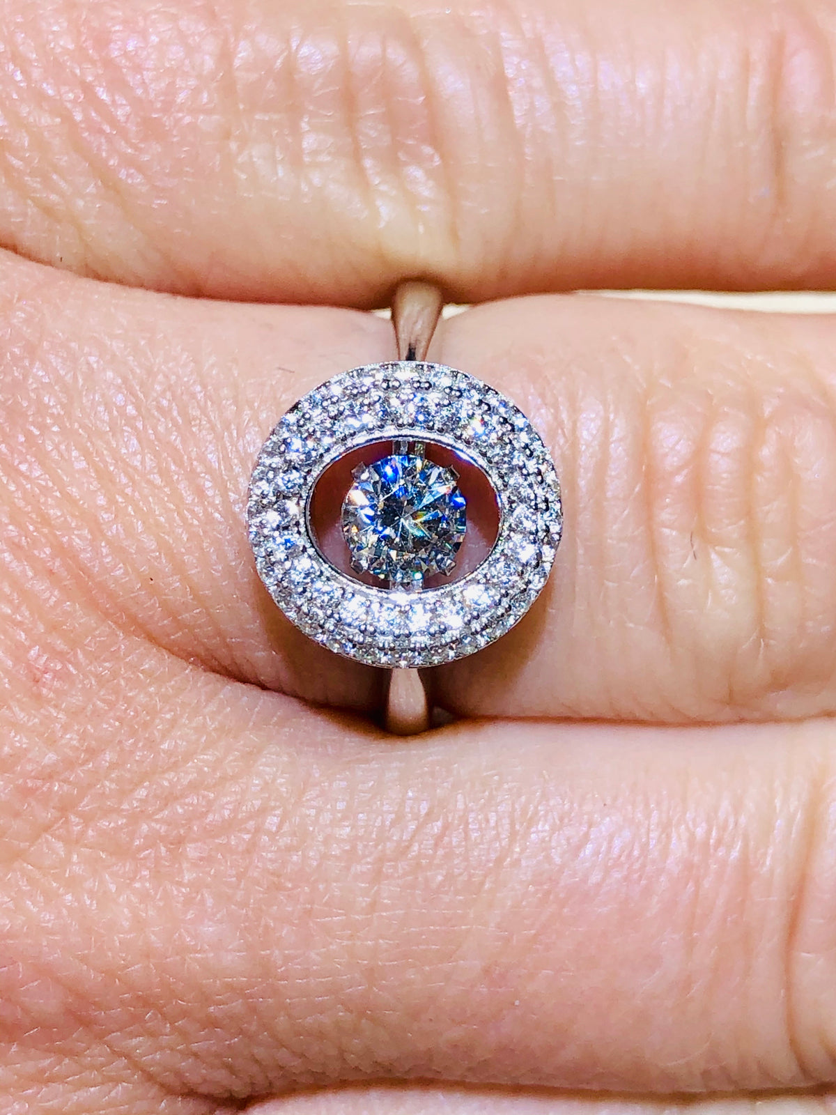 “Dancing Dangling Diamond” Halo Oval Ring