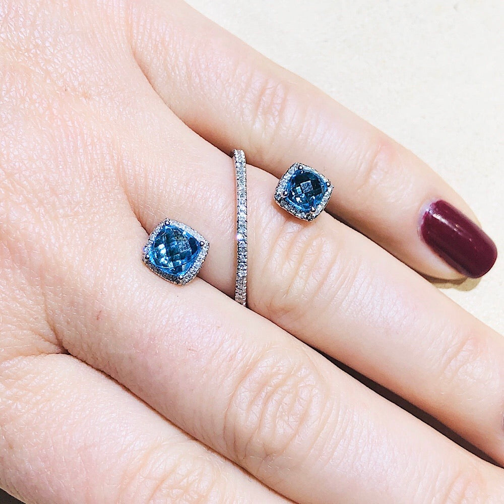 14Kt White Gold Blue Topaz and Diamond open crossover ring