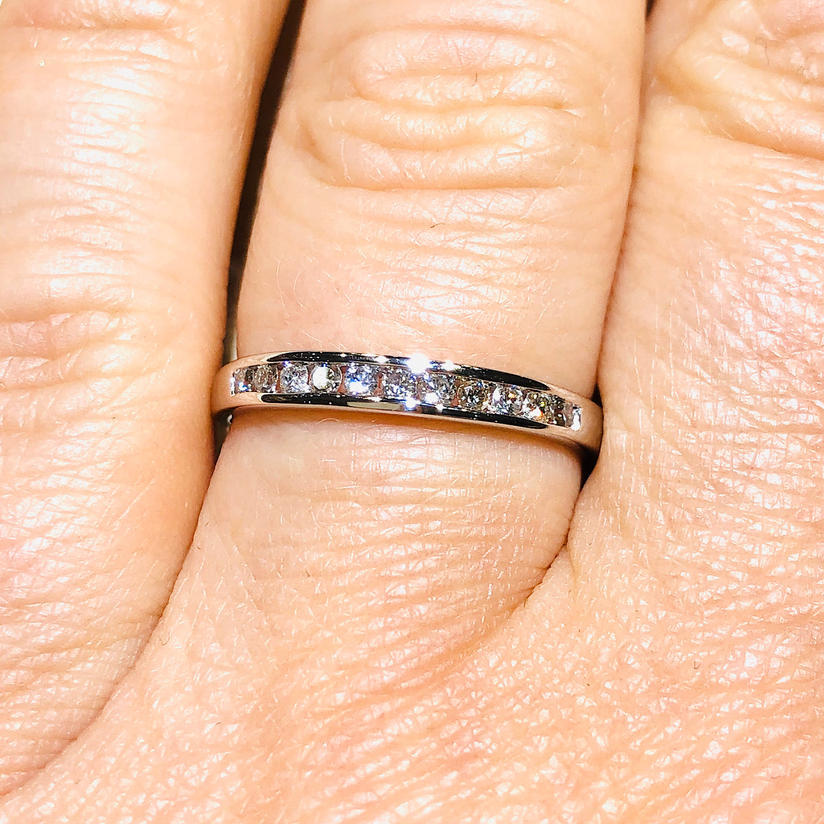 0.25Ctw 11 Channel Diamond set Wedding Band